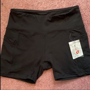 Brand New Mid-Rose Biker Shorts with Pockets